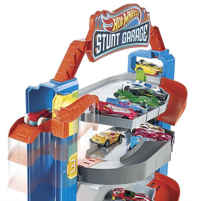 HOT WHEELS - Pista Hot Wheels Garaje Stunt con ascensor y auto incluido