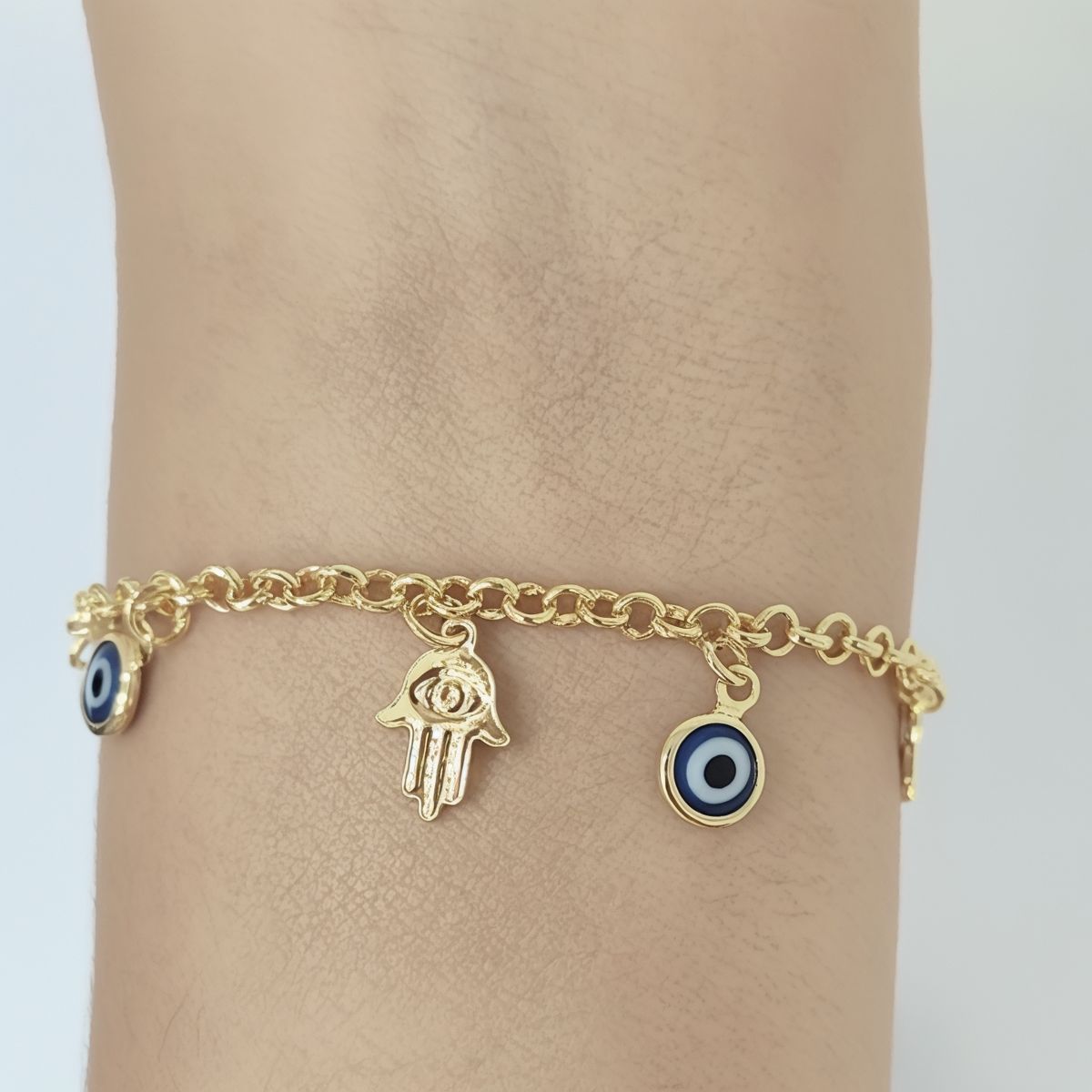ANDREA COGGIOLA JOYAS - Pulsera Ojo Turco Mano Fátima Enchapada Oro 18K