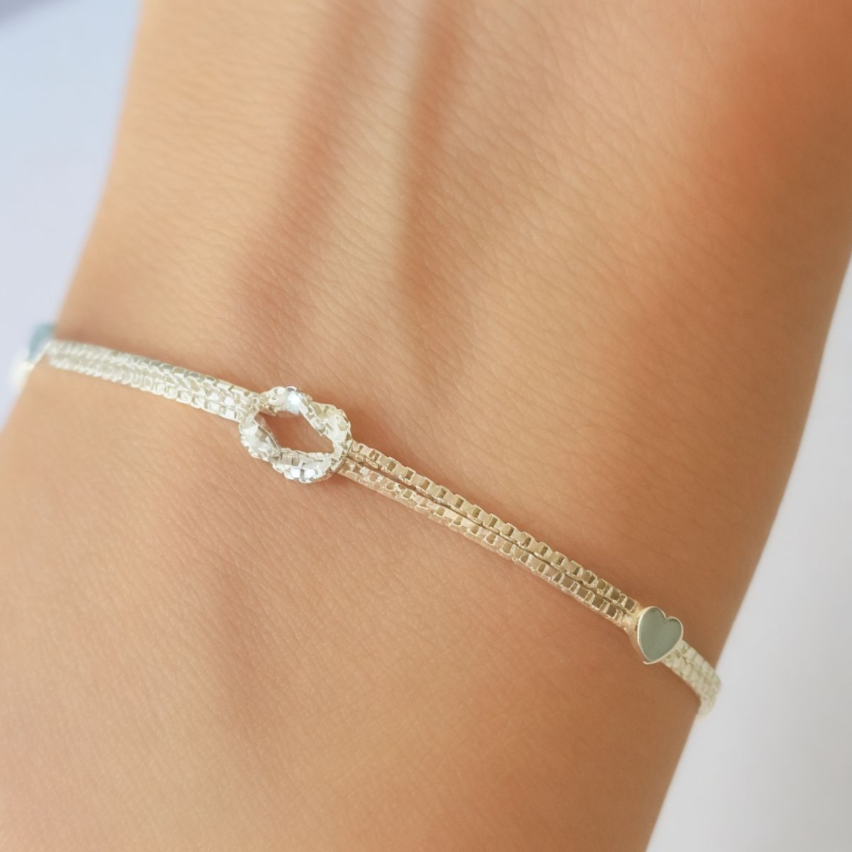 COGGIOLA - Pulsera Nudo 2 Corazones Plata 925