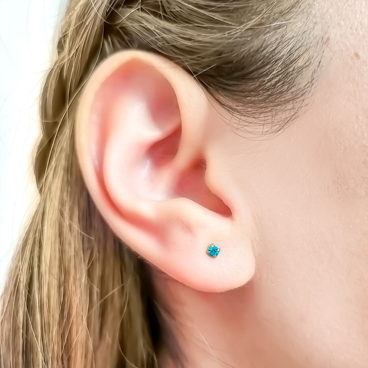 ANDREA COGGIOLA JOYAS - Aros Bebé Circón Celeste 2mm Enchapado Oro 18K