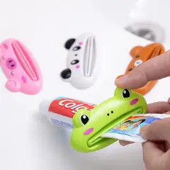 UNIVERSAL - EXPRIMIDOR PASTA DIENTES INFANTIL