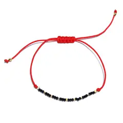 ANDREA COGGIOLA JOYAS - Pulsera Cristal Negro Enchapada Oro 18K Cordón Rojo