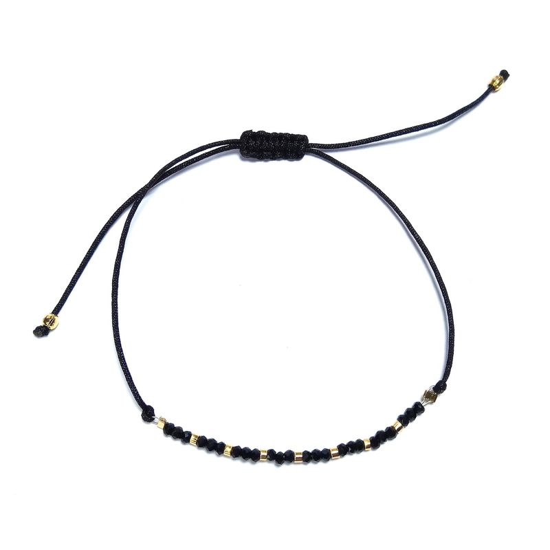 ANDREA COGGIOLA JOYAS - Pulsera Cristal Negro Enchapada en Oro 18K Cordón Negro