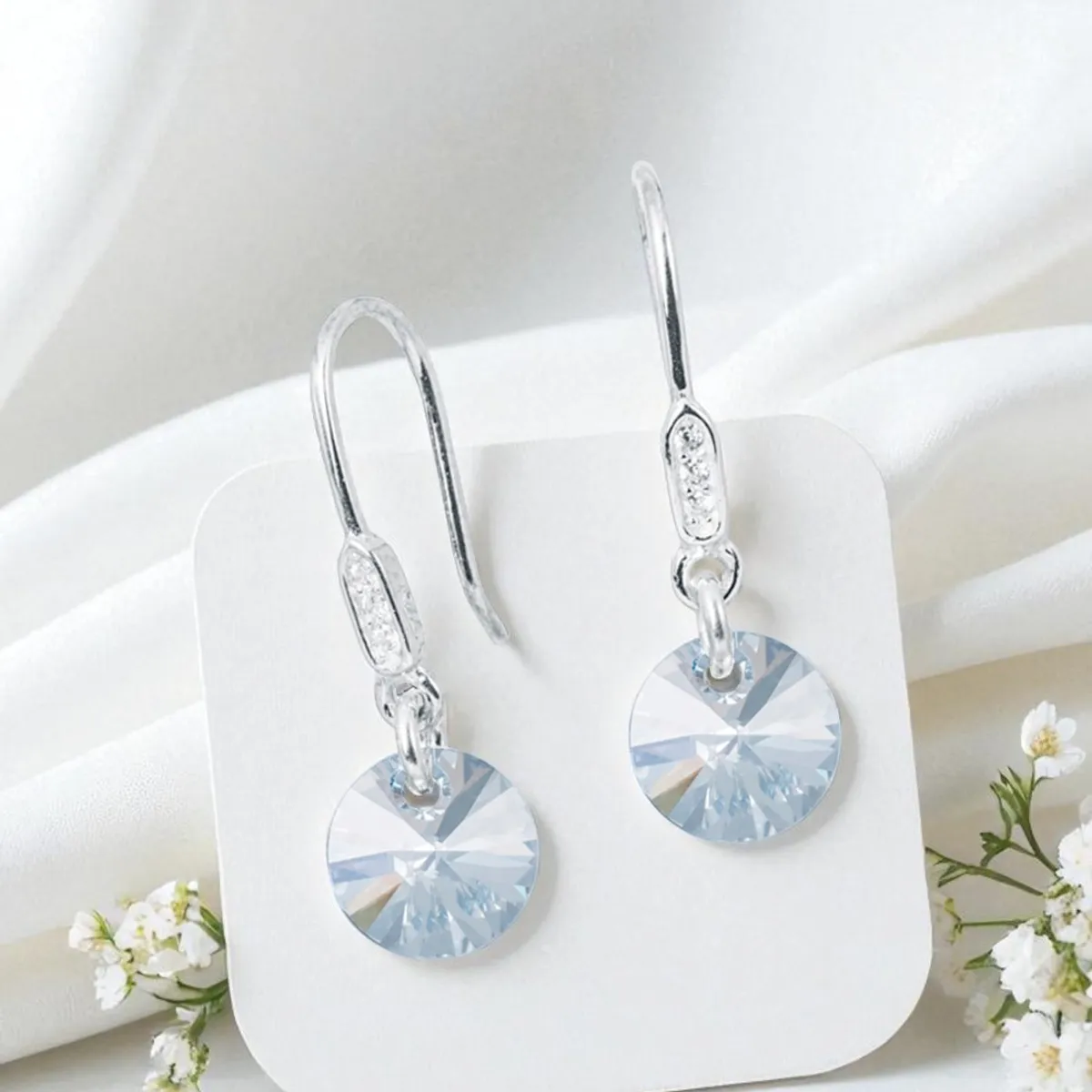 JOYAS MONTERO - Aros Punto De Luz Circon Plata 925 creado con cristales de Swarovski®  Blue Shade