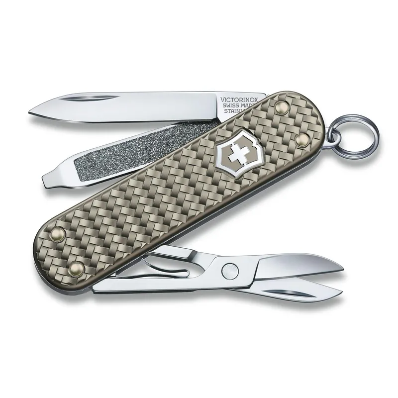 VICTORINOX - Navaja Pequeña Classic Precious Alox Gris