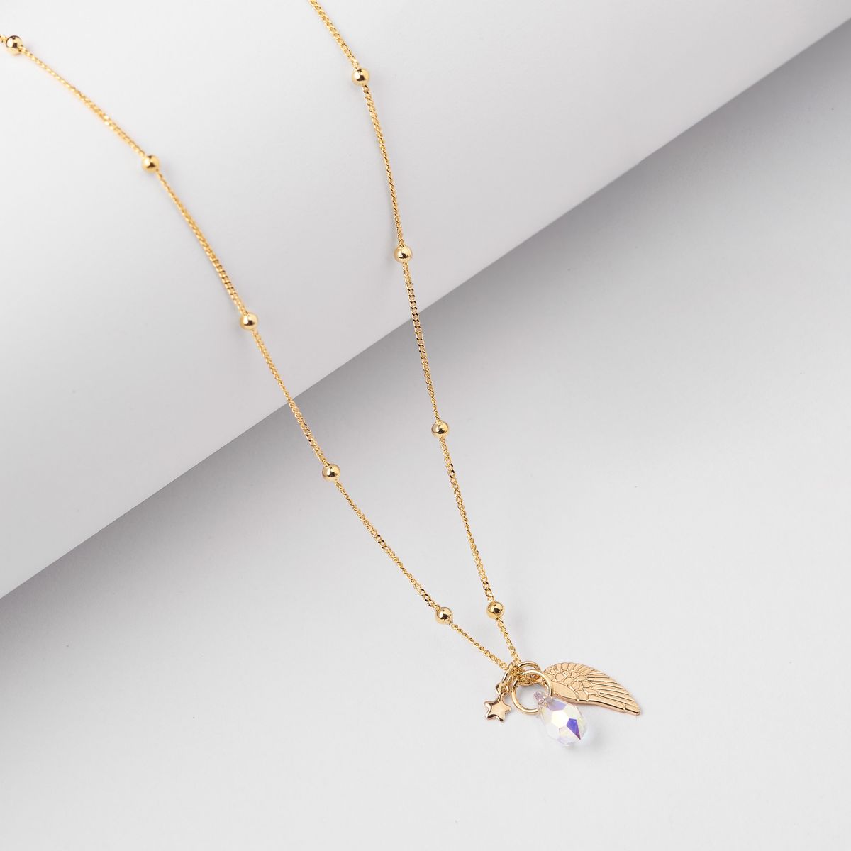 BY LAS CAYETANAS - Collar Ala de Angel Gold con Estrella Guía y cristal Swarovski ®️