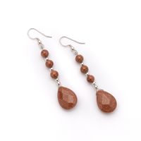 Aros gota con piedra del sol