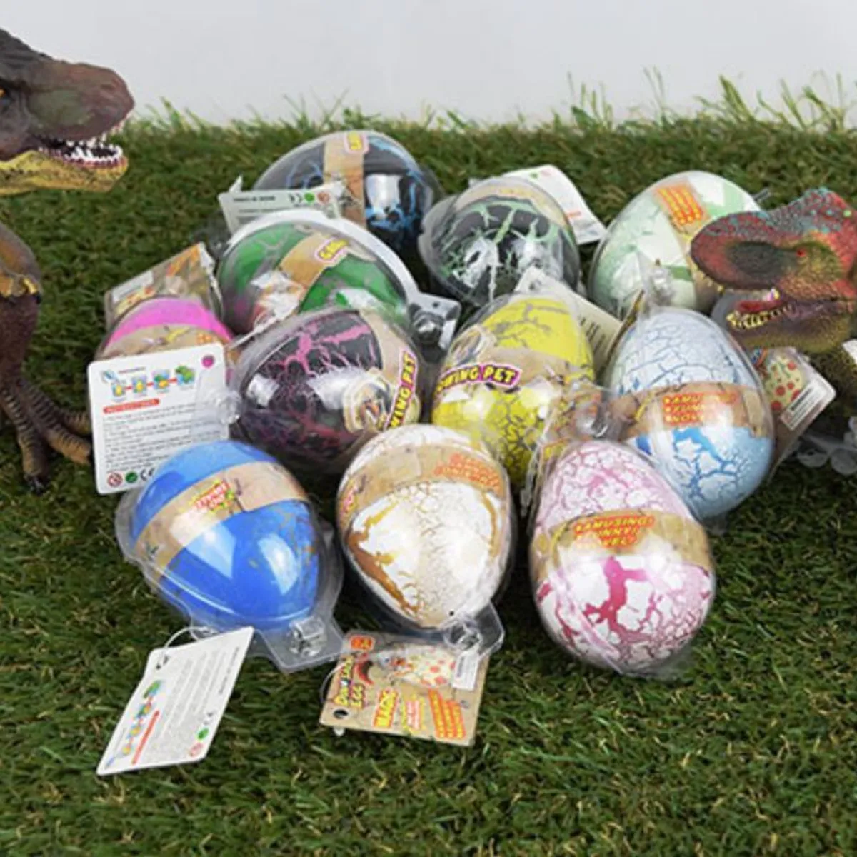 KUANGYE - 12pack Huevos Sorpresas Dinosaurios Que Crecen En Agua 8cm