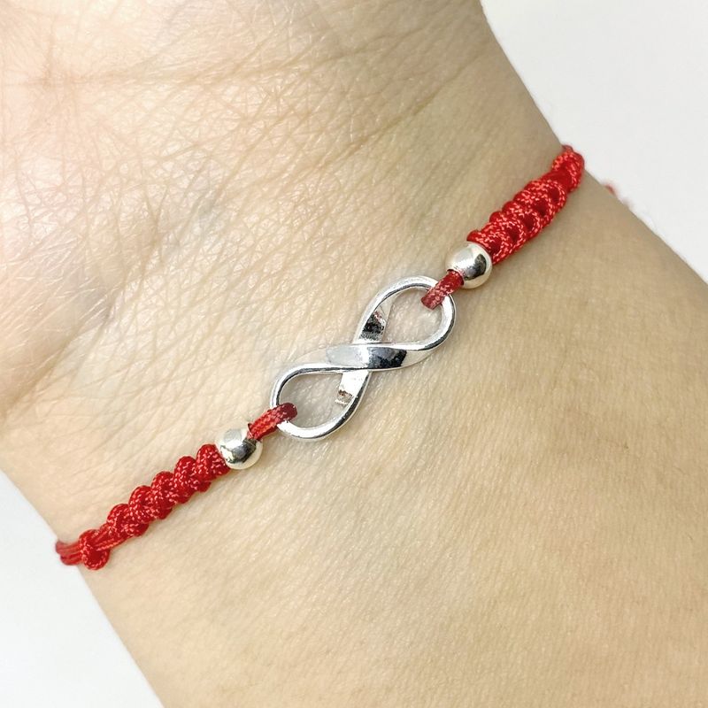 ANDREA COGGIOLA JOYAS - Pulsera Infinito Plata Fina 925 Cordón Rojo