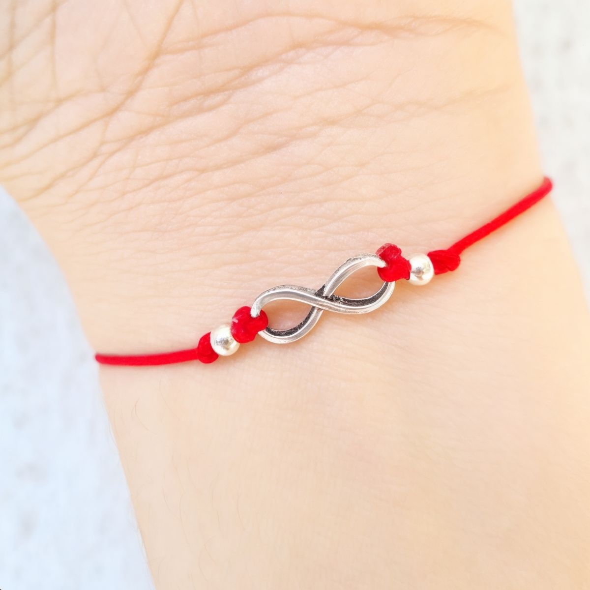 ANDREA COGGIOLA JOYAS - Pulsera Infinito Plata Fina 925 Cordón Rojo