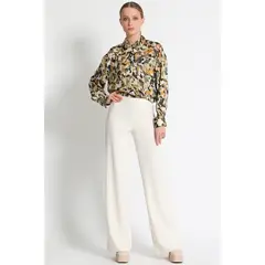 LIOLA - Pantalón Flare Liso Crudo