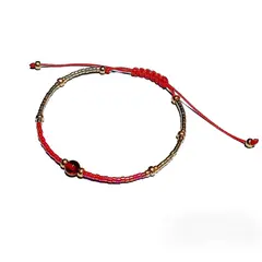 CORAZÓN DE ÁMBAR - Pulsera protectora con delicas rojas y bañadas en oro TOP
