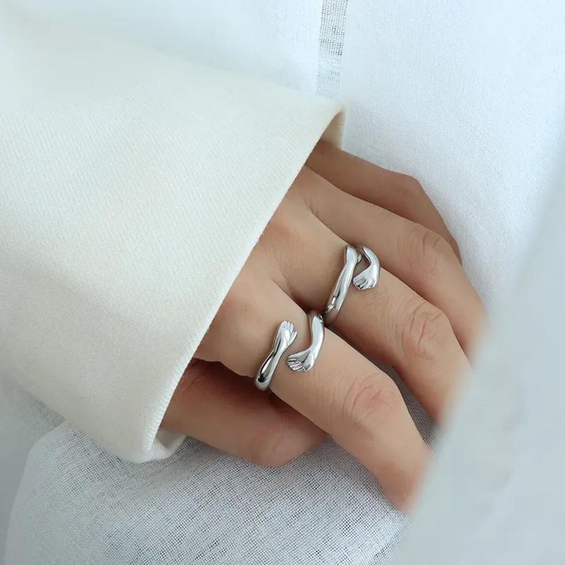 GENERICO - ANILLO MUJER ABRAZO Acero inoxidable aleación plata S925