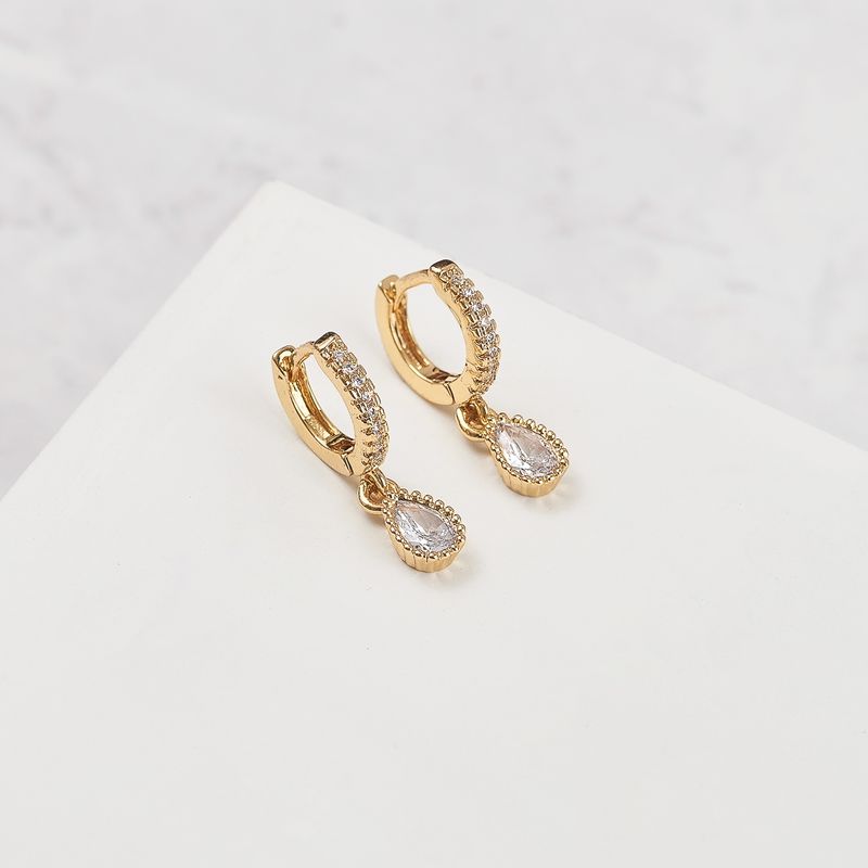 BY LAS CAYETANAS - Aros Argollas FRIDA con gota blanca bañados en Oro 18k