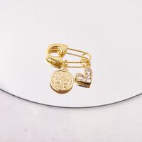 Ganchito de protección bañado en Oro 18k medalla San Benito