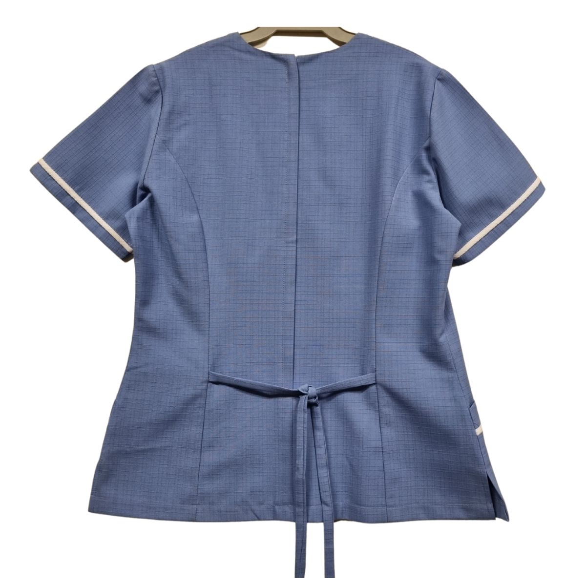 90 GRADOS - Chaquetilla Celeste Con Ribetes Blancos Modelo Cruzado Para Mujer