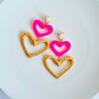 AROS MUJER CORAZON COLGANTE - VISCOSA Y LUREX CON ACERO QUIRÚRGICO