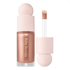 RARE BEAUTY - Iluminador Líquido Positive Light Transcend 8ml