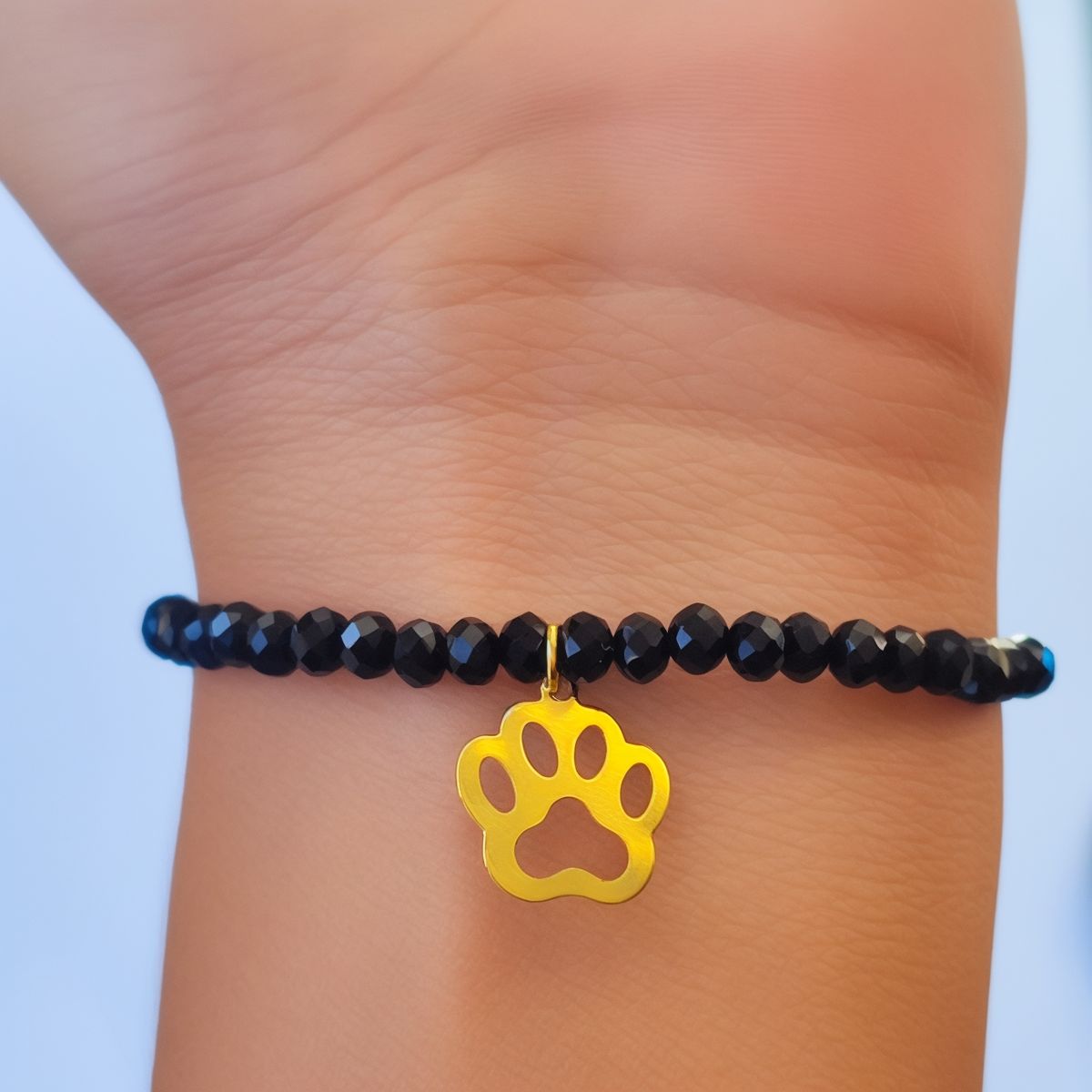 COGGIOLA - Pulsera Elásticada Cristales Negro Huella Perro Enchapado Oro 18K
