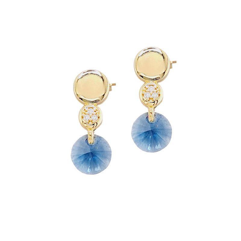 JOYAS MONTERO - Aros Punto  De Luz Gold Cristal Genuino Denim Blue.