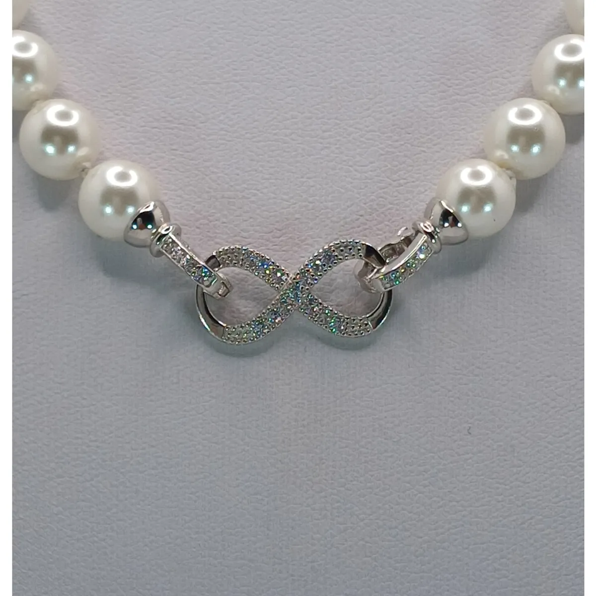 CAT JOYAS - Collar de perlas shell broche infinito de plata fina 925 con baño de rodio con circones