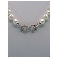 Collar de perlas shell broche infinito de plata fina 925 con baño de rodio con circones