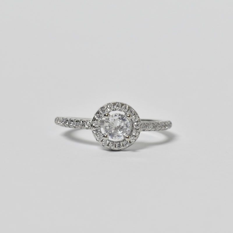 ROSETT - Anillo halo con circón central sujeto a 4 pistilos
