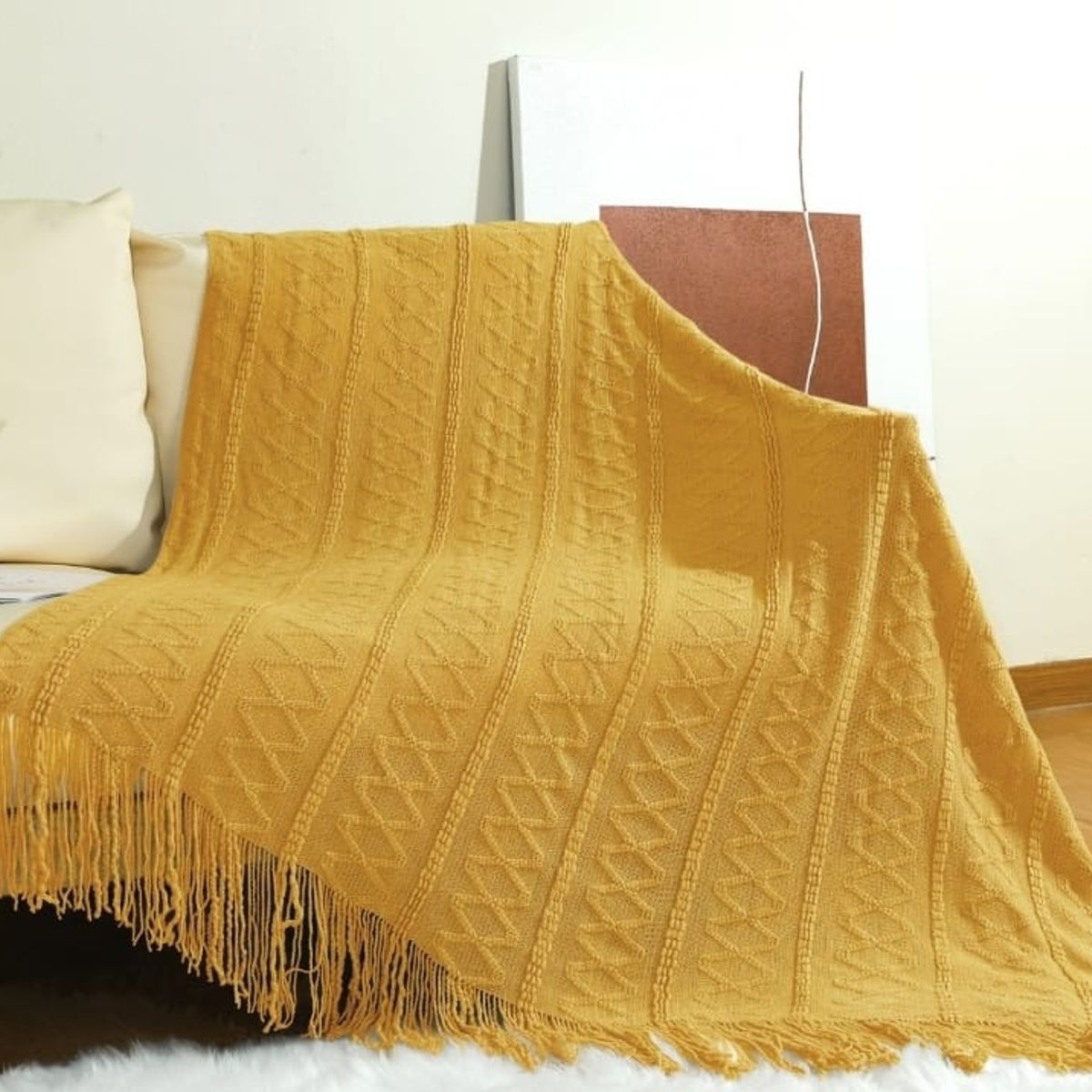 ANGELES DEL HOGAR - Manta para sofa tejida con Flecos 172x127cm Amarilla