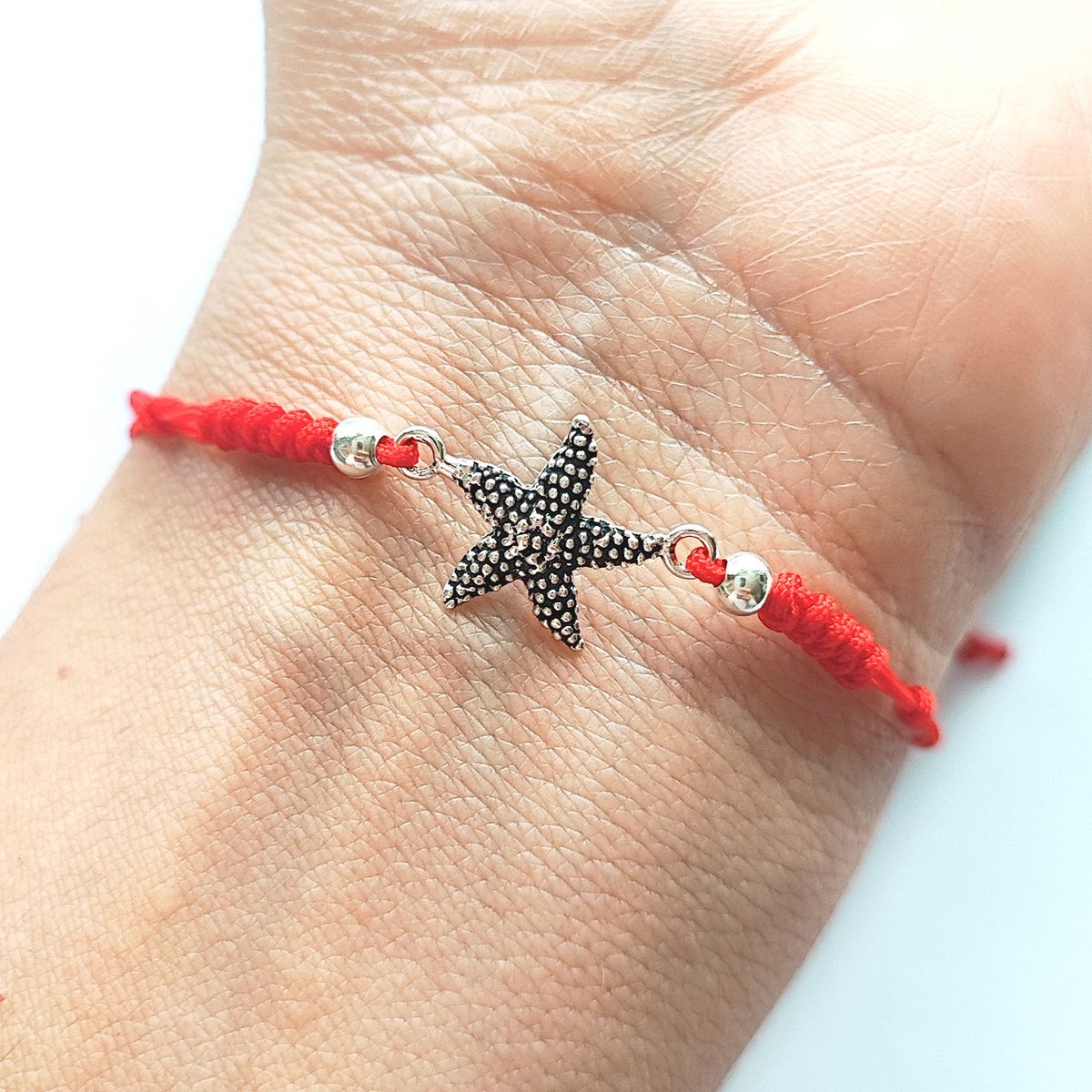 COGGIOLA - Pulsera Estrella De Mar Plata Fina 925 Envejecida Cordón Rojo
