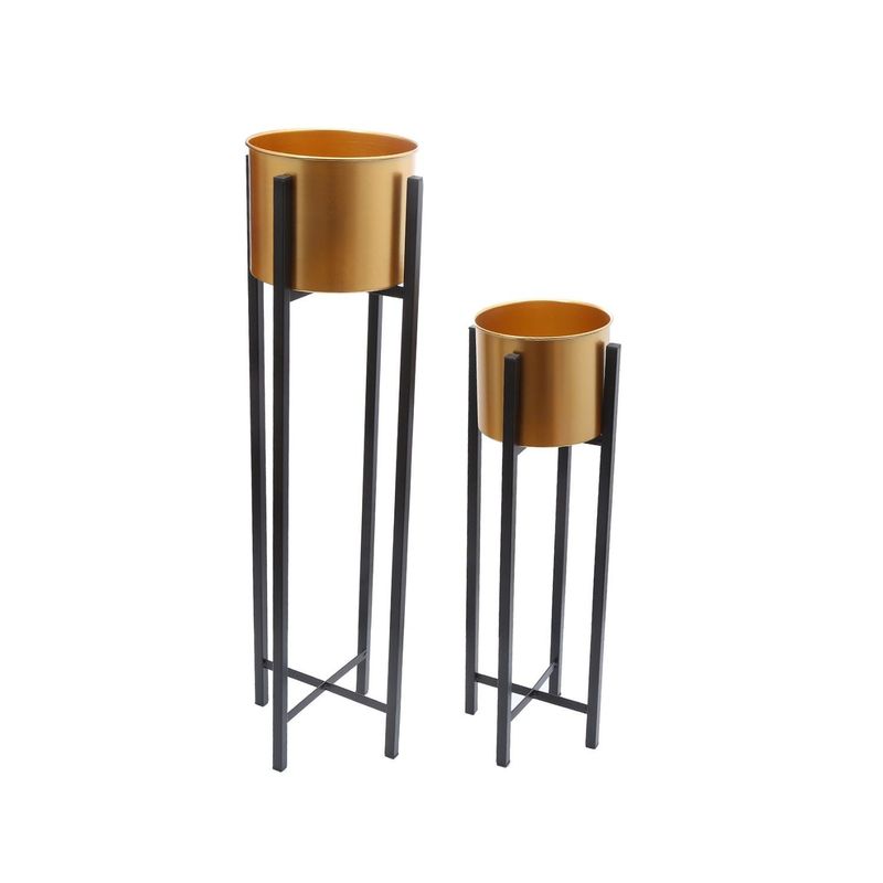HOME ESSENTIALS - Set 2 maceteros con pedestal dorados