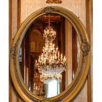Espejo dorado ovalado 75 X 55