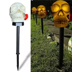 GENERICO - Estaca Solar De Calavera Con Flor Roja En Luz Cálida Jardín