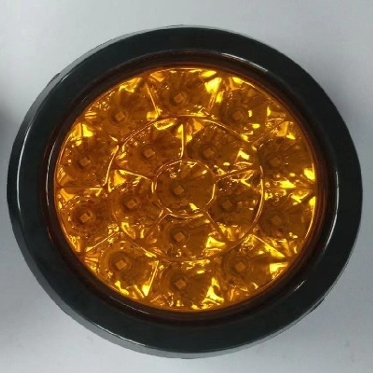 FLAMINGOS - 2,5" Diametro Farol de 9 LED con conector Multivoltaje Ambar