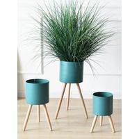 Macetero Metálico turquesa con patas de madera