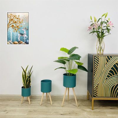 Imagen 2 del producto Macetero Metálico turquesa con patas de madera