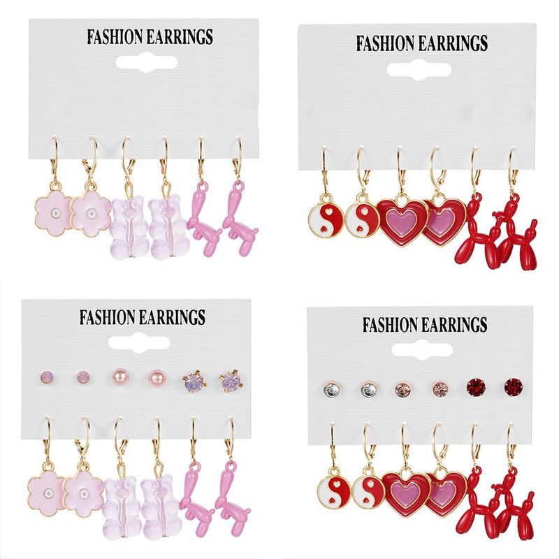 VATYERTY - 24 pares de pendientes de mariposa acrílica para mujeres