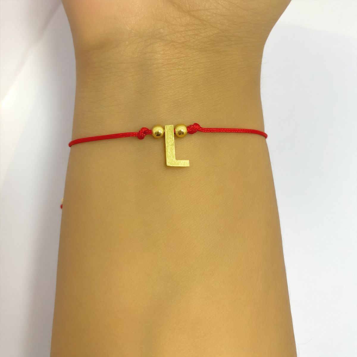 COGGIOLA - Pulsera Letra L Cordón Rojo Enchapado Oro 18K