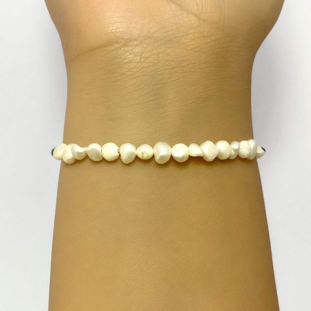 ANDREA COGGIOLA JOYAS - Pulsera Perlas de Río Cordón Negro Plata Fina 925