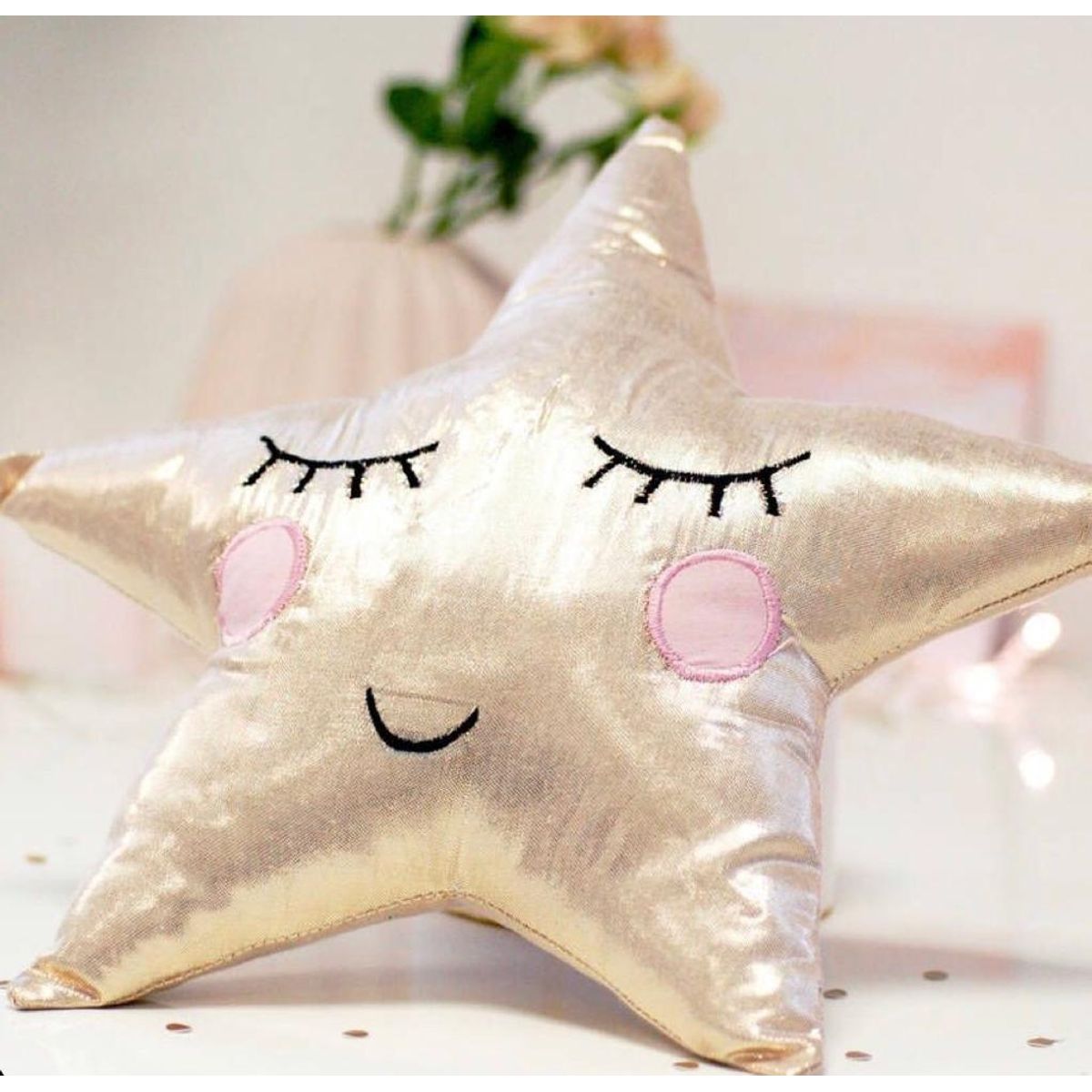 GENERICO - ALMOHADA DE ESTRELLA DORADA