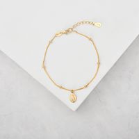 Pulsera nudo Virgen de los Rayos bañada en Oro 18k