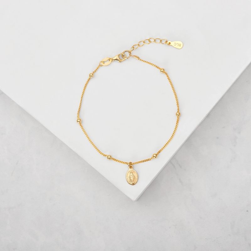 BY LAS CAYETANAS - Pulsera nudo Virgen de los Rayos bañada en Oro 18k