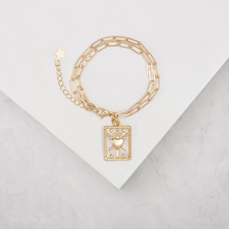BY LAS CAYETANAS - Pulsera doble eslabón rectangular con Corazón detente
