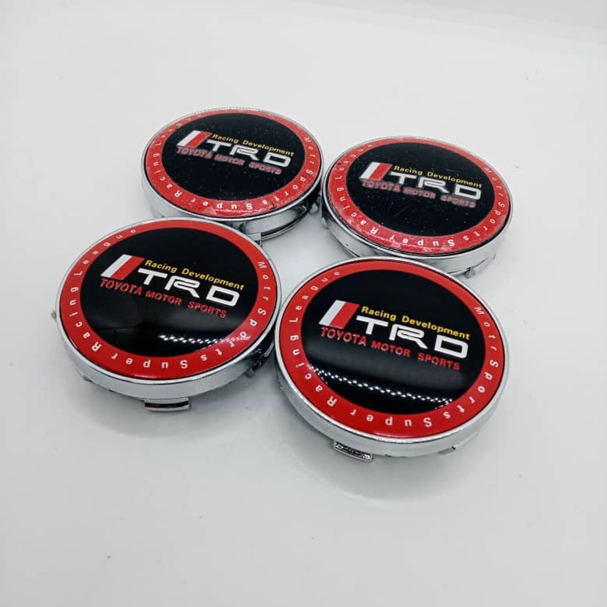 GENERICO - Tapa centro Llantas auto 56mm universal TRD NEGRO borde rojo