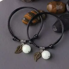 GENERICO - Pulseras Fosforescentes Ajustables con Encanto de Pluma