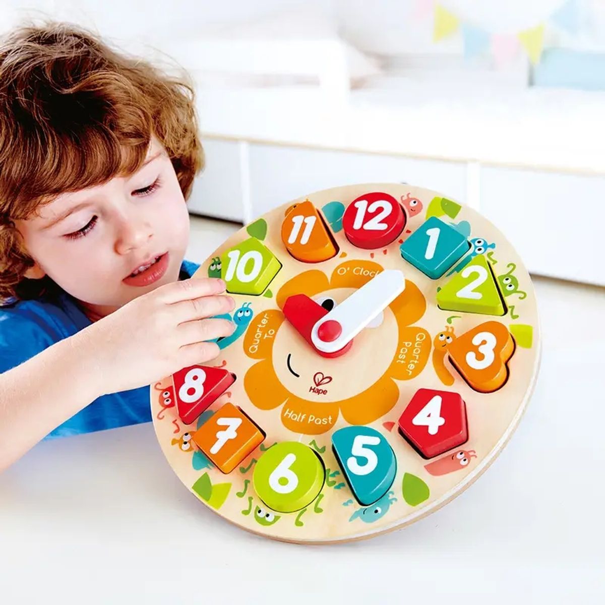 HAPE - Reloj didactico Multicolor ideal para el desarrollo Infantil