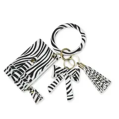 ECOSUSI - Llavero De Pulsera Para Mujer Con Borla Y Lazo - Zebra