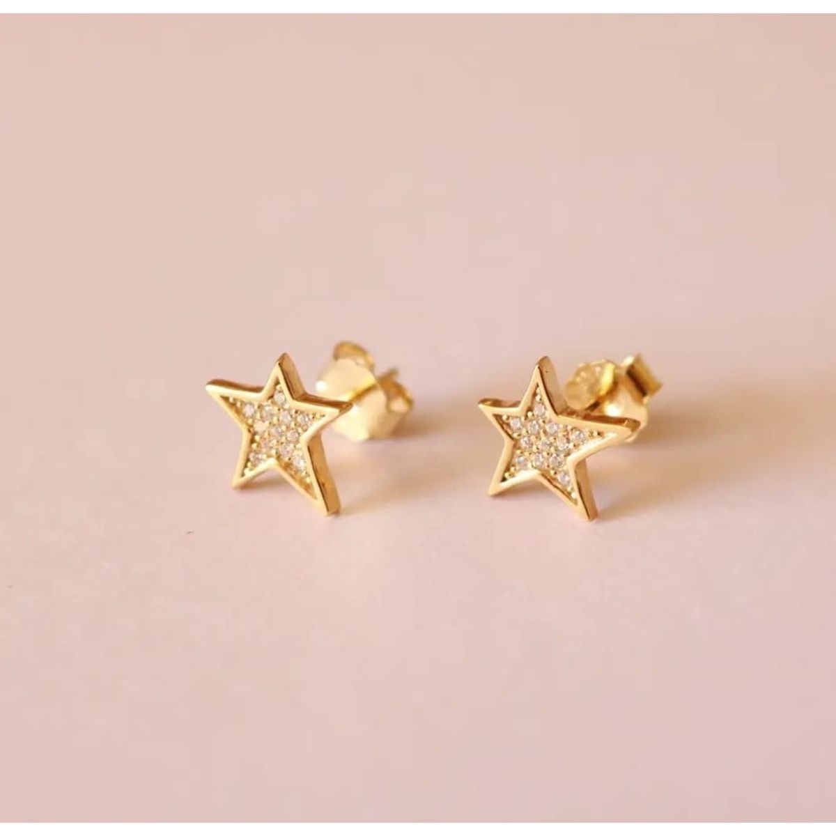 JOYAS VALDES GARCIA - Aros estrellas irregulares con circones