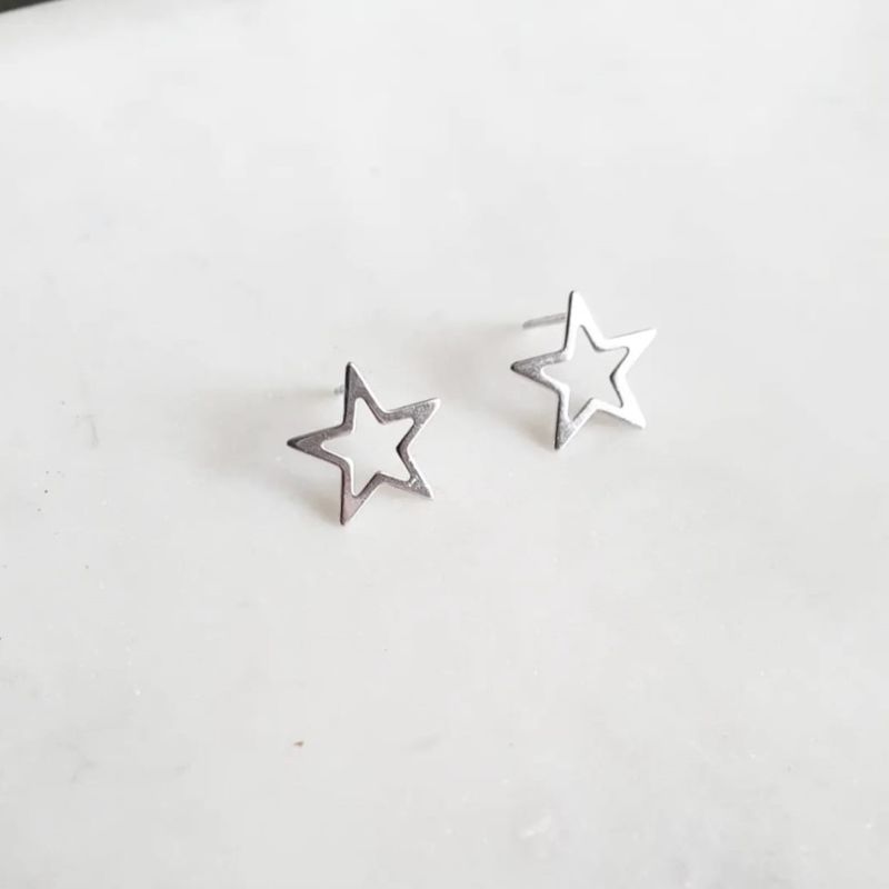 JOYAS VALDES GARCIA - Aros estrella solo contorno