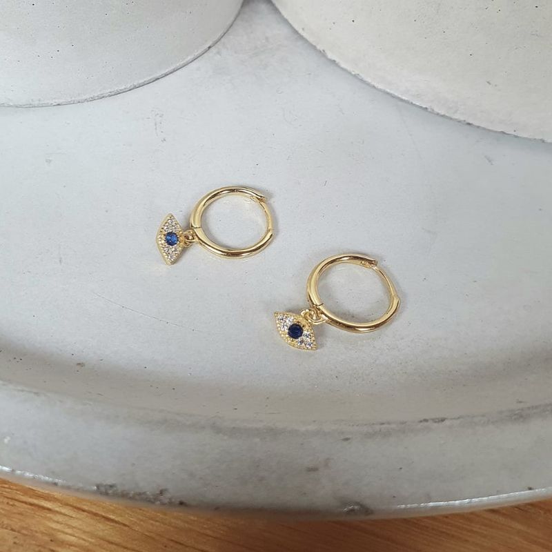 JOYAS VALDES GARCIA - Argollas ojo azul colgando