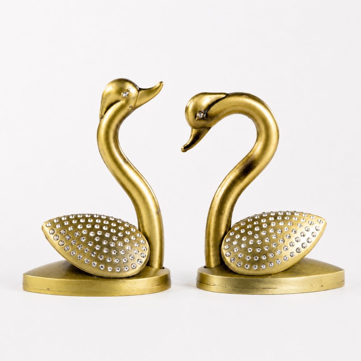 HOMESTAR - Set de 2 figuras decorativas de cisnes dorados con cristales